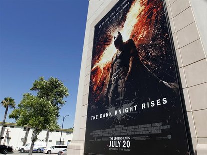 A poster for the Warner Bros. film "The Dark Knight Rises" is displayed at Warner Bros. studios in Burbank, California, July 20, 2012. REUTE A poster for the Warner Bros. film "The Dark Knight Rises" is displayed at Warner Bros. studios in Burbank, California, July 20, 2012. REUTE