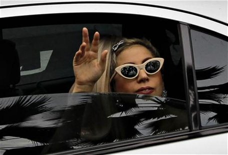 U.S. singer Lady Gaga waves to fans upon arriving at the JetQuay CIP (Commercially Important People) terminal at Changi Airport in Singapore U.S. singer Lady Gaga waves to fans upon arriving at the JetQuay CIP (Commercially Important People) terminal at Changi Airport in Singapore