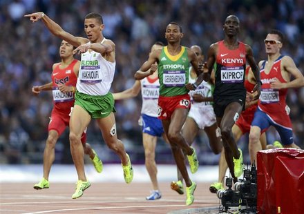 Algeria's Taoufik Makhloufi reacts as he wins his men's 1500m semi-final during the London 2012 Olympic Games at the Olympic Stadium August Algeria's Taoufik Makhloufi reacts as he wins his men's 1500m semi-final during the London 2012 Olympic Games at the Olympic Stadium August