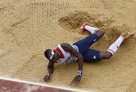 Britain's Phillips Idowu competes in the men's triple jump qualification during the London 2012 Olympic Games at the Olympic Stadium August Britain's Phillips Idowu competes in the men's triple jump qualification during the London 2012 Olympic Games at the Olympic Stadium August