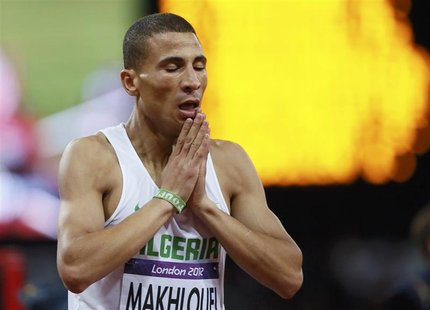 Algeria's Taoufik Makhloufi reacts after he won the men's 1500m final during the London 2012 Olympic Games at the Olympic Stadium August 7, Algeria's Taoufik Makhloufi reacts after he won the men's 1500m final during the London 2012 Olympic Games at the Olympic Stadium August 7,