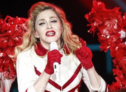 U.S. singer Madonna performs on stage during her MDNA tour at the Olympic Stadium in Moscow August 7, 2012. REUTERS/Maxim Shemetov U.S. singer Madonna performs on stage during her MDNA tour at the Olympic Stadium in Moscow August 7, 2012. REUTERS/Maxim Shemetov