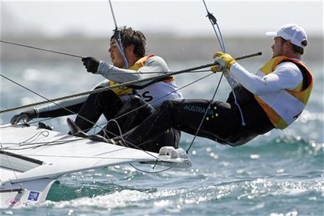 Australia's Nathan Outteridge and Iain Jensen sail in the ninth race of the 49er class at the London 2012 Olympic Games in Weymouth and Port Australia's Nathan Outteridge and Iain Jensen sail in the ninth race of the 49er class at the London 2012 Olympic Games in Weymouth and Port
