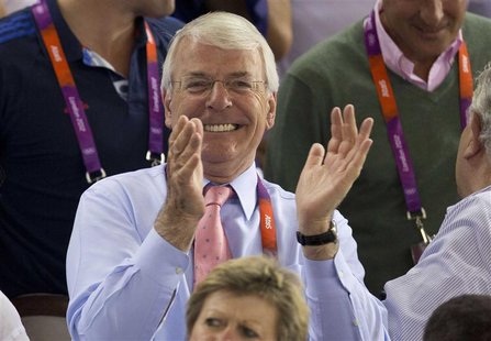 Former British Prime Minister John Major reacts as Britain's Chris Hoy wins the gold medal for the men's keirin at the Velodrome during the Former British Prime Minister John Major reacts as Britain's Chris Hoy wins the gold medal for the men's keirin at the Velodrome during the