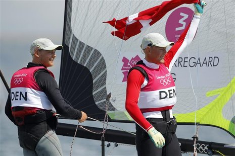 Denmark's Allan Norregaard and Peter Lang (R) celebrate as they cross the finish line to win bronze in the 49er sailing class at the London Denmark's Allan Norregaard and Peter Lang (R) celebrate as they cross the finish line to win bronze in the 49er sailing class at the London
