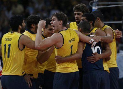 Brazil's players celebrate defeating Argentina in their men's quarterfinal volleyball match at Earls Court during the London 2012 Olympic Ga Brazil's players celebrate defeating Argentina in their men's quarterfinal volleyball match at Earls Court during the London 2012 Olympic Ga