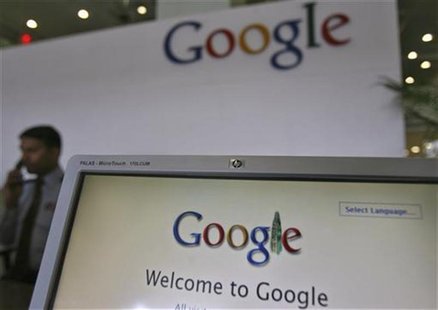 A security personnel answers a call at the reception counter of the Google office in the southern Indian city of Hyderabad February 6, 2012. A security personnel answers a call at the reception counter of the Google office in the southern Indian city of Hyderabad February 6, 2012.