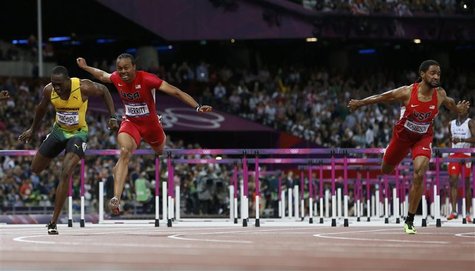 Aries Merritt of the U.S. (C) crosses the finish line ahead of compatriot Jason Richardson and Jamaica's Hansle Parchment (L) to finish firs Aries Merritt of the U.S. (C) crosses the finish line ahead of compatriot Jason Richardson and Jamaica's Hansle Parchment (L) to finish firs