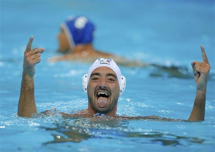 Italy's Maurizio Felugo celebrates his team's win over Hungary during their Men's Quarterfinal water polo match during the London 2012 Olymp Italy's Maurizio Felugo celebrates his team's win over Hungary during their Men's Quarterfinal water polo match during the London 2012 Olymp
