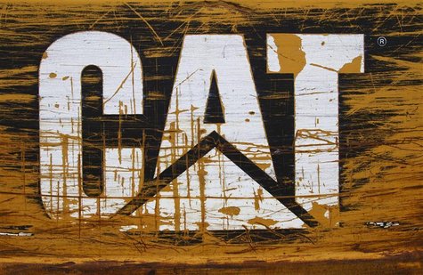 A scratched and worn Caterpillar logo is pictured at the back of a bulldozer in the rental equipment yard of Holt Caterpillar, the largest C A scratched and worn Caterpillar logo is pictured at the back of a bulldozer in the rental equipment yard of Holt Caterpillar, the largest C