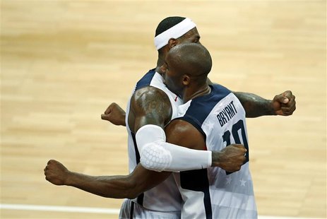 Lebron James (L) and Kobe Bryant both of the U.S. celebrate victory after their game against Australia at their men's quarterfinal basketbal Lebron James (L) and Kobe Bryant both of the U.S. celebrate victory after their game against Australia at their men's quarterfinal basketbal