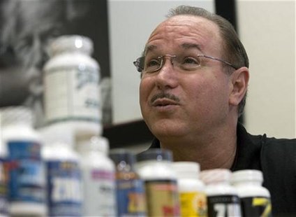 Victor Conte, owner of the now-defunct BALCO lab, talks next to bottles of his nutritional supplements in his office in Burlingame, Californ Victor Conte, owner of the now-defunct BALCO lab, talks next to bottles of his nutritional supplements in his office in Burlingame, Californ