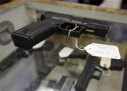A hand gun, very similar to the gun used by alleged gunman Wade Michael Page, is seen at The Shooter Shop, where Page purchased the weapon, A hand gun, very similar to the gun used by alleged gunman Wade Michael Page, is seen at The Shooter Shop, where Page purchased the weapon,