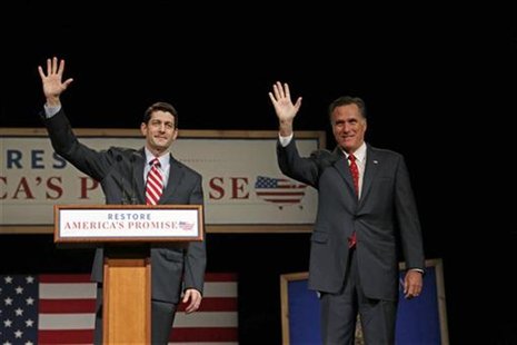 House Budget Chairman Paul Ryan (L) (R-WI) introduces Republican presidential candidate Mitt Romney (R) as he addresses supporters at Lawren House Budget Chairman Paul Ryan (L) (R-WI) introduces Republican presidential candidate Mitt Romney (R) as he addresses supporters at Lawren