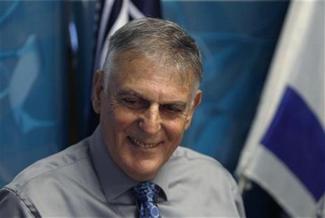 Israeli scientist Daniel Shechtman poses for a photo during a news conference at Israel's Technion Institute of Technology in the northern c Israeli scientist Daniel Shechtman poses for a photo during a news conference at Israel's Technion Institute of Technology in the northern c