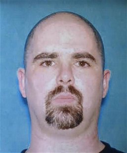Alleged gunman Wade Michael Page is seen in this undated handout from the FBI, released at the Oak Creek Police Department on August 6, 2012 Alleged gunman Wade Michael Page is seen in this undated handout from the FBI, released at the Oak Creek Police Department on August 6, 2012