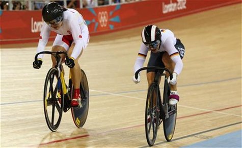 China's Guo Shuang (L) competes against Germany's Kristina Vogel during the track cycling women's sprint bronze finals at the Velodrome duri China's Guo Shuang (L) competes against Germany's Kristina Vogel during the track cycling women's sprint bronze finals at the Velodrome duri
