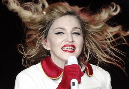 U.S. singer Madonna performs on stage during her MDNA tour at the Olympic Stadium in Moscow August 7, 2012. REUTERS/Maxim Shemetov U.S. singer Madonna performs on stage during her MDNA tour at the Olympic Stadium in Moscow August 7, 2012. REUTERS/Maxim Shemetov