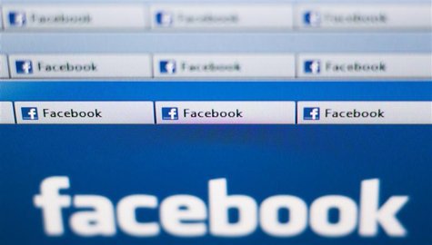 Facebook website pages opened in an internet browser are seen in this photo illustration taken in Lavigny May 16, 2012. REUTERS/Valentin Fla Facebook website pages opened in an internet browser are seen in this photo illustration taken in Lavigny May 16, 2012. REUTERS/Valentin Fla
