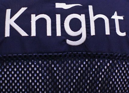 A Knight Capital logo is seen on a trader's jacket on the floor of the New York Stock Exchange August 1, 2012. REUTERS/Brendan McDermid A Knight Capital logo is seen on a trader's jacket on the floor of the New York Stock Exchange August 1, 2012. REUTERS/Brendan McDermid
