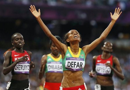 Ethiopia's Meseret Defar reacts after she won the women's 5000m final during the London 2012 Olympic Games at the Olympic Stadium August 10, Ethiopia's Meseret Defar reacts after she won the women's 5000m final during the London 2012 Olympic Games at the Olympic Stadium August 10,