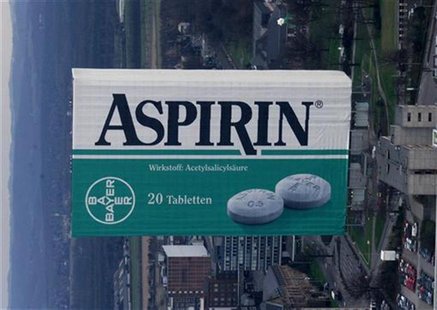 An aerial view shows an administration building of the German Bayer AG chemical company in Leverkusen wrapped as giant "Aspirin" box. An aerial view shows an administration building of the German Bayer AG chemical company in Leverkusen wrapped as giant "Aspirin" box.