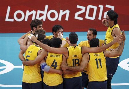 Brazil's players celebrate winning their men's semi-final volleyball match against Italy at Earls Court during the London 2012 Olympic Games Brazil's players celebrate winning their men's semi-final volleyball match against Italy at Earls Court during the London 2012 Olympic Games