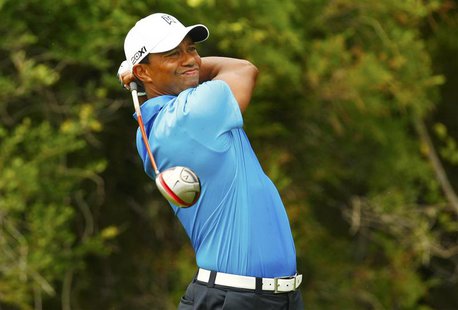 Tiger Woods watches his tee shot on the second hole during the second round of the PGA Championship golf tournament at The Ocean Course on K Tiger Woods watches his tee shot on the second hole during the second round of the PGA Championship golf tournament at The Ocean Course on K