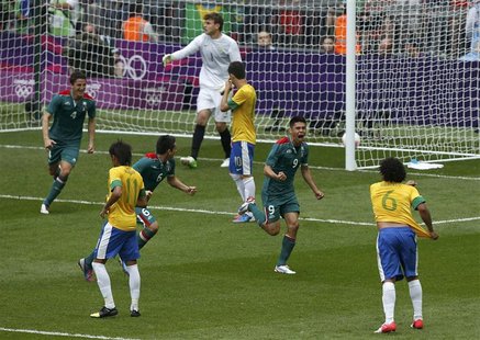 Mexico's Oribe Peralta (2nd R) scoring his second goal against Brazil during their men's soccer final gold medal match at Wembley Stadium du Mexico's Oribe Peralta (2nd R) scoring his second goal against Brazil during their men's soccer final gold medal match at Wembley Stadium du