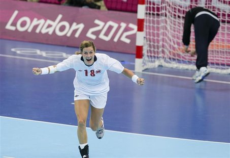 Norway's Linn-Kristin Koren celebrates after scoring a goal against Montenegro during their women's gold medal match at the Basketball Arena Norway's Linn-Kristin Koren celebrates after scoring a goal against Montenegro during their women's gold medal match at the Basketball Arena