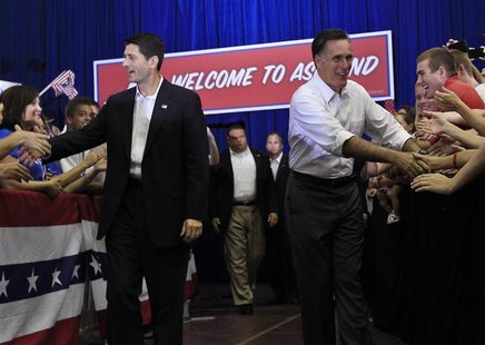 U.S. Republican presidential candidate Mitt Romney (R) and U.S. Congressman Paul Ryan (R-WI) shake hands with supporters during a campaign e U.S. Republican presidential candidate Mitt Romney (R) and U.S. Congressman Paul Ryan (R-WI) shake hands with supporters during a campaign e