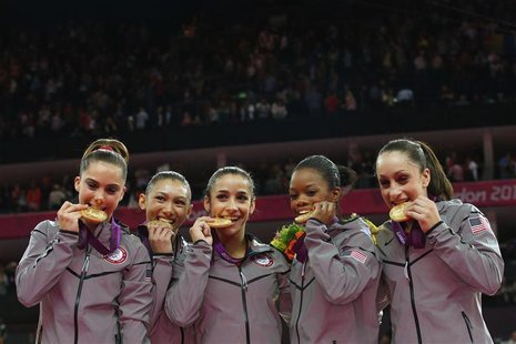 Team U.S.A members, Gabrielle Douglas (2nd R), Alexandra Raisman (C), Jordyn Wieber (R), McKayla Maroney (L) and Kyla Ross (2nd L) pose with Team U.S.A members, Gabrielle Douglas (2nd R), Alexandra Raisman (C), Jordyn Wieber (R), McKayla Maroney (L) and Kyla Ross (2nd L) pose with