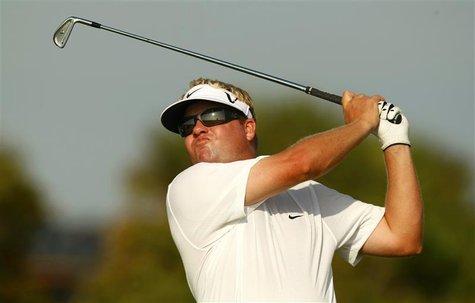 Carl Pettersson of Sweden watches his tee shot on the 14th hole during the weather delayed conclusion of the third round of the PGA Champion Carl Pettersson of Sweden watches his tee shot on the 14th hole during the weather delayed conclusion of the third round of the PGA Champion