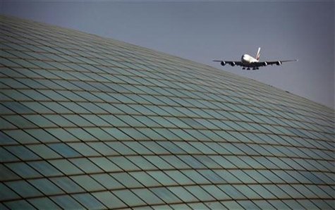 An Emirates airlines Airbus A380 comes in for landing over the roof of the Beijing Capital International Airport's train station March 6, 20 An Emirates airlines Airbus A380 comes in for landing over the roof of the Beijing Capital International Airport's train station March 6, 20