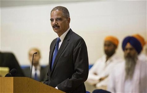 United States Attorney General Eric Holder speaks during the wake and visitation service for victims of last Sunday's attack at a Sikh templ United States Attorney General Eric Holder speaks during the wake and visitation service for victims of last Sunday's attack at a Sikh templ