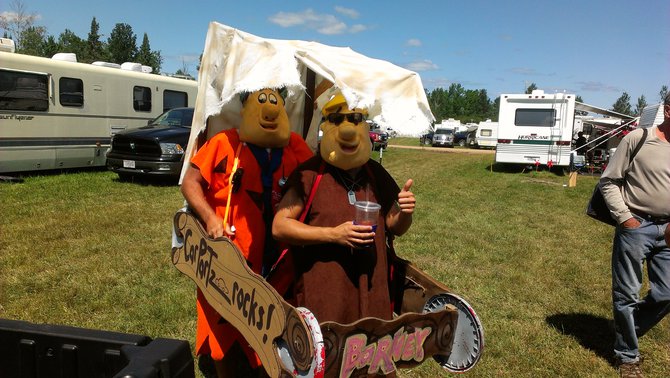 Fred and Barney in the spirit for the Flintstones at the Fuddrock play at Fuddfest Saturday Afternoon