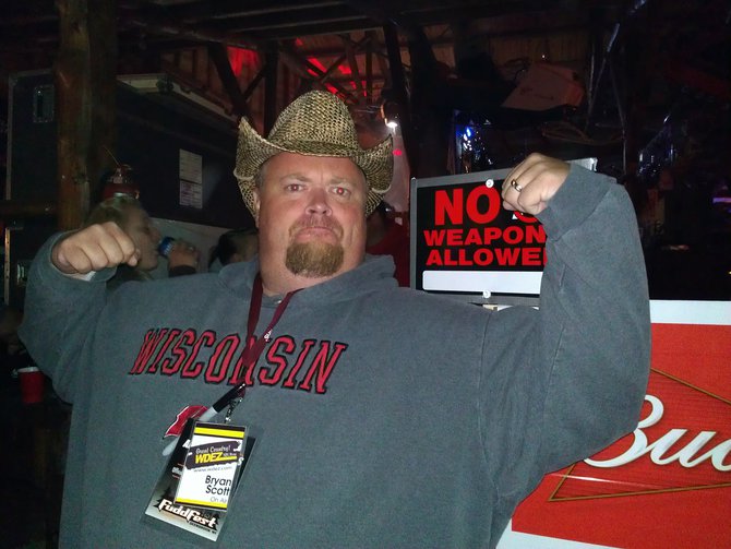 No Weapons Allowed so Bryan had to check his guns at the door