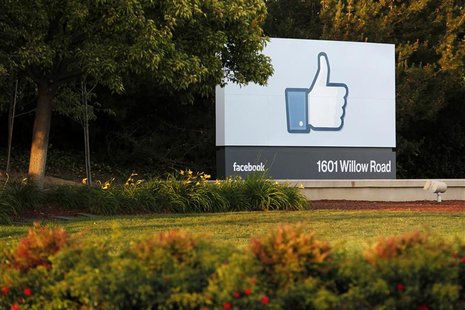 The sun sets on the entrance sign at Facebook's headquarters in Menlo Park, California, the night before the company's IPO launch, May 17, 2 The sun sets on the entrance sign at Facebook's headquarters in Menlo Park, California, the night before the company's IPO launch, May 17, 2