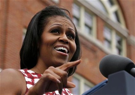 First lady Michelle Obama introduces U.S. President Barack Obama at an event at the Alliant Energy Amphitheater in Dubuque, Iowa, August 15, First lady Michelle Obama introduces U.S. President Barack Obama at an event at the Alliant Energy Amphitheater in Dubuque, Iowa, August 15,