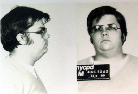 A mug-shot of Mark David Chapman, who shot and killed John Lennon, is displayed on the 25th anniversary of Lennon's death at the NYPD in New A mug-shot of Mark David Chapman, who shot and killed John Lennon, is displayed on the 25th anniversary of Lennon's death at the NYPD in New
