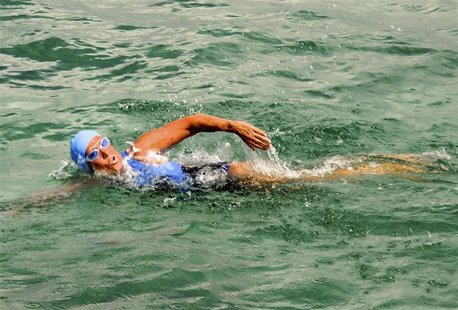 Endurance swimmer Diana Nyad swims off as she begins a more than 100-mile trip across the Florida Straits to the Florida Keys, starting from Endurance swimmer Diana Nyad swims off as she begins a more than 100-mile trip across the Florida Straits to the Florida Keys, starting from