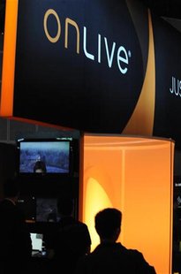 People preview video games at the OnLive booth at the Electronic Entertainment Expo (E3) in Los Angeles, California June 15, 2010. REUTERS/G People preview video games at the OnLive booth at the Electronic Entertainment Expo (E3) in Los Angeles, California June 15, 2010. REUTERS/G