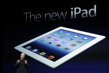 Apple CEO Tim Cook speaks during an Apple event as he introduces the new iPad as an image the device is projected on screen in San Francisco Apple CEO Tim Cook speaks during an Apple event as he introduces the new iPad as an image the device is projected on screen in San Francisco