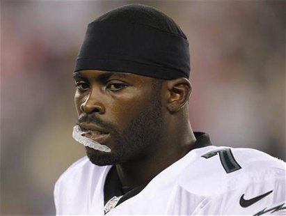 Philadelphia Eagles quarterback Michael Vick is seen shortly before the start of the first quarter of their preseason NFL football game agai Philadelphia Eagles quarterback Michael Vick is seen shortly before the start of the first quarter of their preseason NFL football game agai