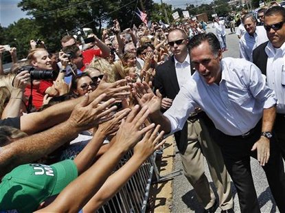 Republican U.S. presidential candidate Mitt Romney shakes hands with supporters outside a campaign stop in High Point, North Carolina August Republican U.S. presidential candidate Mitt Romney shakes hands with supporters outside a campaign stop in High Point, North Carolina August
