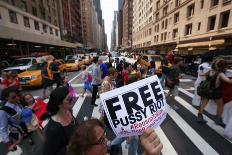 Protesters march through midtown Manhattan while demonstrating in solidarity with the Russian punk band Pussy Riot in New York August 17, 20 Protesters march through midtown Manhattan while demonstrating in solidarity with the Russian punk band Pussy Riot in New York August 17, 20