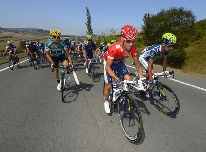 Movistar Team rider Alejandro Valverde of Spain (C) cycles during the fourth stage of the Tour of Spain "La Vuelta" cycling race between Bar Movistar Team rider Alejandro Valverde of Spain (C) cycles during the fourth stage of the Tour of Spain "La Vuelta" cycling race between Bar