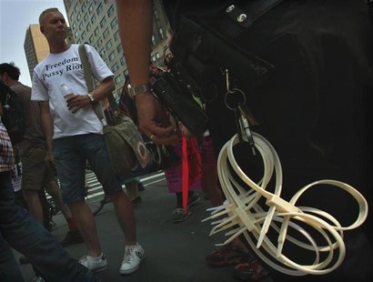 Protesters march through midtown Manhattan while demonstrating in solidarity with the Russian punk band Pussy Riot in New York August 17, 20 Protesters march through midtown Manhattan while demonstrating in solidarity with the Russian punk band Pussy Riot in New York August 17, 20
