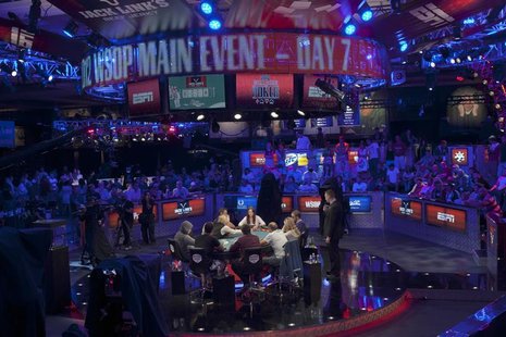 Poker players compete in Day 7 of the World Series of Poker $10,000 buy-in, no-limit Texas Hold'em main event at the Rio Hotel & Casino in L Poker players compete in Day 7 of the World Series of Poker $10,000 buy-in, no-limit Texas Hold'em main event at the Rio Hotel & Casino in L