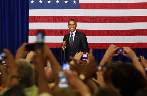 U.S. President Barack Obama smiles during a campaign event at Canyon Springs High School in Las Vegas, Nevada August 22, 2012. REUTERS/Kevin U.S. President Barack Obama smiles during a campaign event at Canyon Springs High School in Las Vegas, Nevada August 22, 2012. REUTERS/Kevin